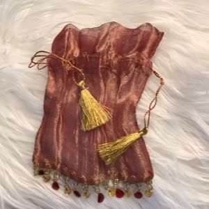 Jewelry pouch with beaded fringe